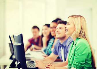 Image showing students with computers studying at school