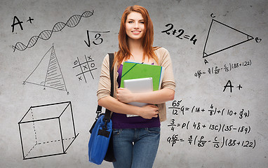 Image showing smiling student with bag, folders and tablet pc