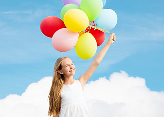 Image showing happy girl with colorful balloons