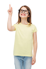 Image showing smiling cute little girl in black eyeglasses