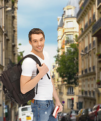 Image showing travelling student with backpack and book