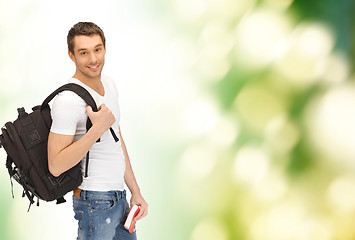 Image showing travelling student with backpack and book