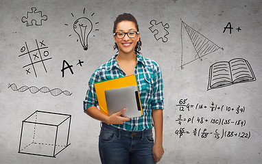 Image showing student in eyeglasses with folders and tablet pc