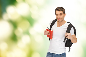 Image showing travelling student with backpack and book