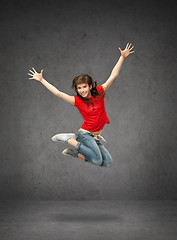 Image showing happy jumping teenage girl