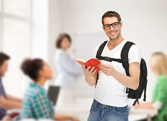 Image showing travelling student with backpack and book