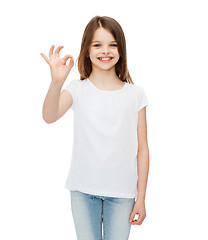 Image showing little girl in white t-shirt showing ok gesture