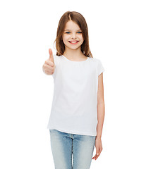 Image showing little girl in blank white tshirt showing thumbsup