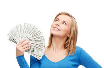 Image showing smiling girl with dollar cash money