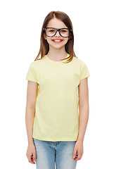 Image showing smiling cute little girl in black eyeglasses