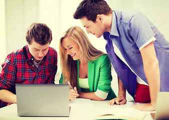 Image showing students writing test or exam in lecture at school