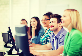 Image showing students with computers studying at school