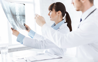 Image showing doctor and nurse exploring x-ray