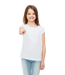 Image showing little girl in blank white t-shirt pointing at you