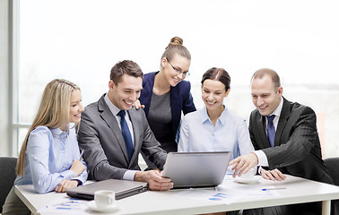 Image showing business team with laptop having discussion