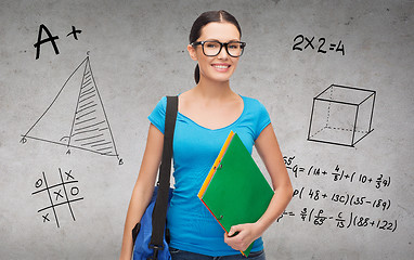 Image showing smiling student with bag and folders