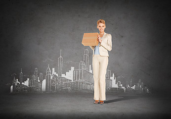 Image showing businesswoman delivering cardboard box