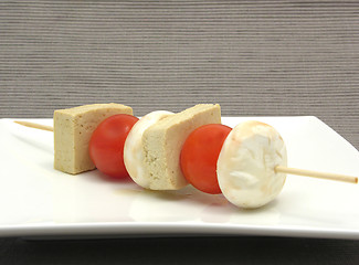 Image showing Vegetable spit with bean curd and rice on white plate