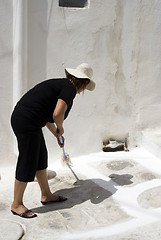 Image showing woman washing street