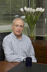Image showing senior executive in office