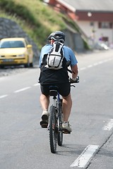 Image showing Senior on bike