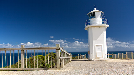 Image showing A White Lighthouse at the sea