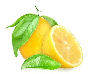 Image showing Yellow lemons with green leaf