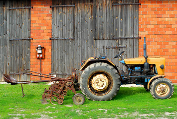 Image showing Tractor and farm