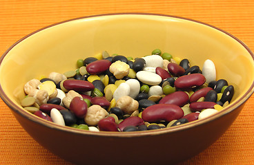 Image showing A close-up view on mixed and colourful legumes in a bowl of ceramic