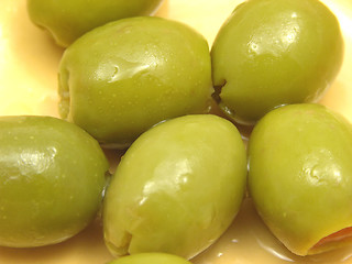 Image showing Olives in oil in a close-up view