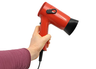 Image showing Hand with blow-drier