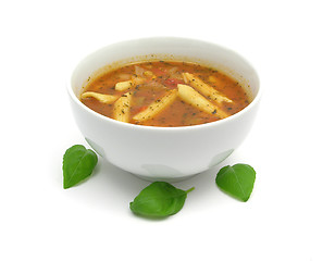 Image showing Noodle soup with tomatoes and herbs on white