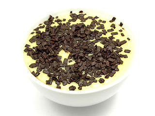 Image showing Custard with grated chocolate in a bowl of china ware