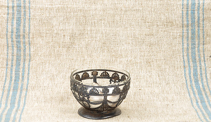 Image showing Bowl of glass on linen sheet