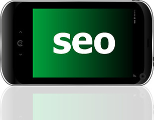 Image showing Web development concept: smartphone with word SEO on display