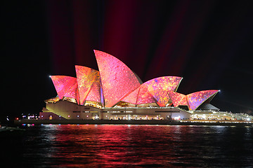 Image showing Sydney Opera House in vibrant pink yellow colours