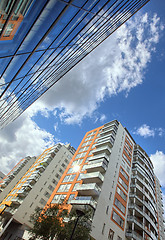 Image showing 	modern apartments with a blue sky