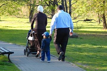 Image showing A family walking