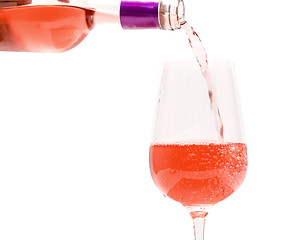 Image showing Pink Wine Pouring into Glass