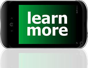 Image showing smart phone with learn more word, business concept