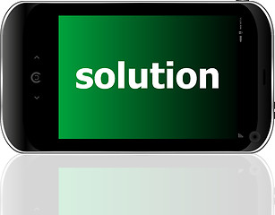 Image showing smartphone with word solution on display, business concept