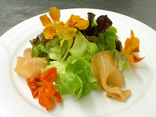 Image showing Salad of smoked salmon with nasturtiums