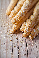 Image showing bread sticks grissini with sesame seeds