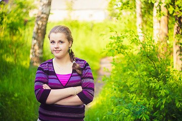 Image showing A Beautiful Young Girl Standing On A Forest Path Road
