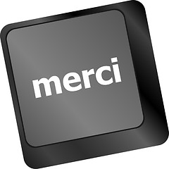 Image showing thank you (merci) word on computer keyboard key