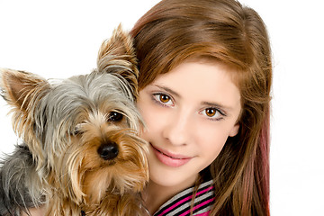 Image showing smiling young girl with her pet yorkshire