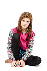 Image showing sitting fashion portrait of young beautiful girl