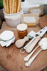 Image showing Serving utensils and condiments