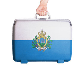 Image showing Used plastic suitcase with stains and scratches