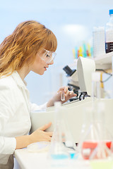 Image showing Young chemist in the laboratory.